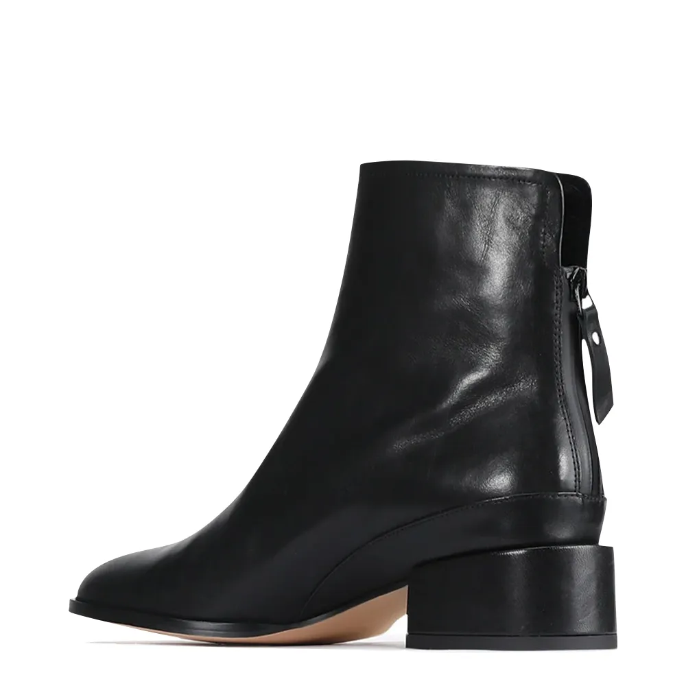 EOS Footwear Women's Cast Leather Back Zip Boot in Black