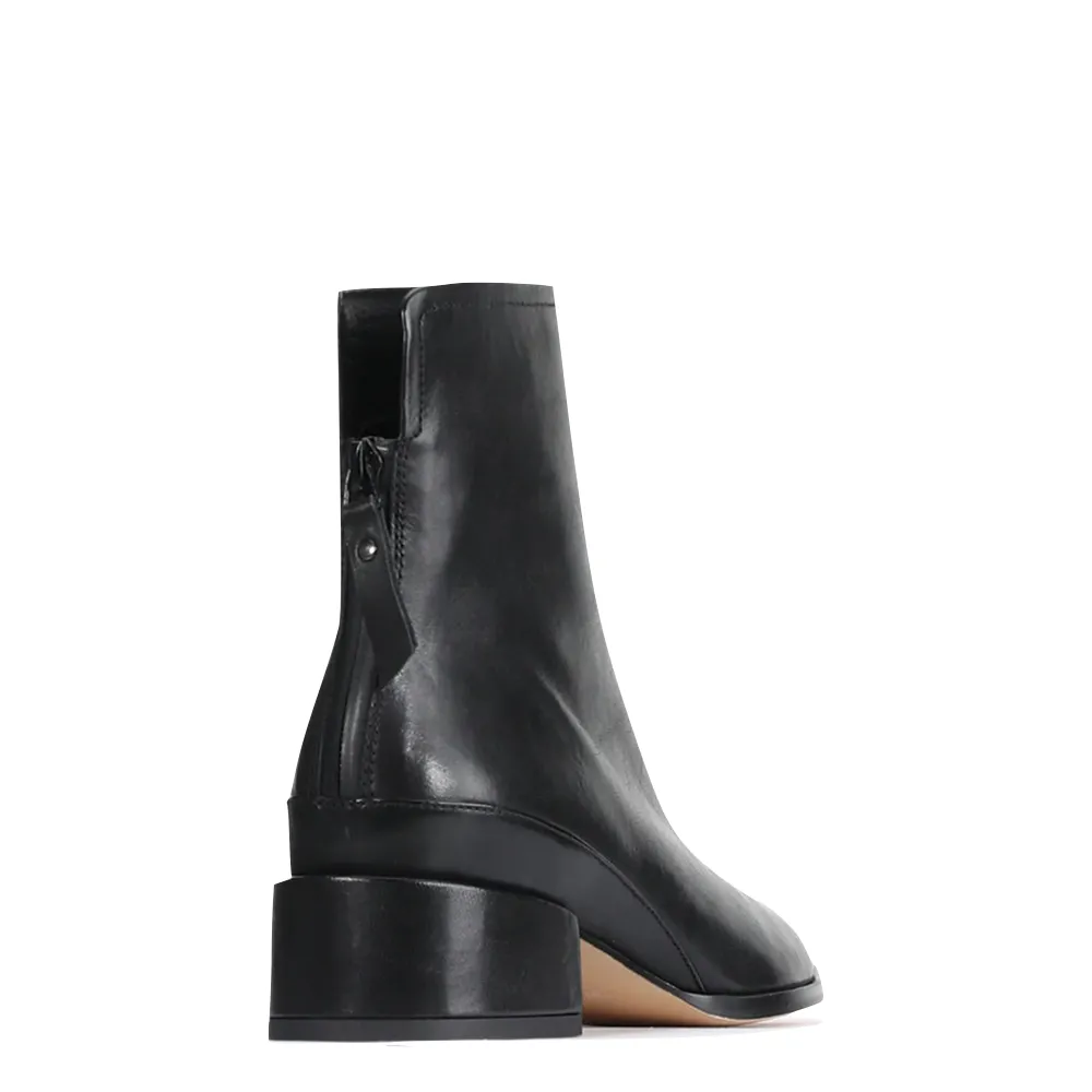 EOS Footwear Women's Cast Leather Back Zip Boot in Black